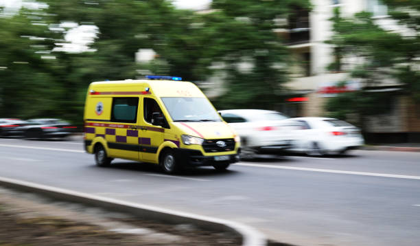  An ambulance traveling along the road, highlighting the importance of medical transportation.