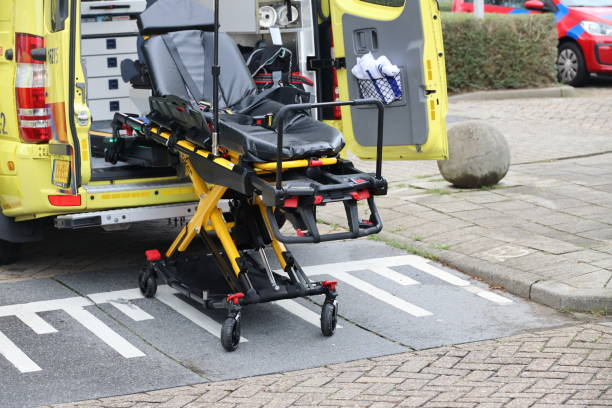Ambulance with a wheelchair ramp, facilitating non-emergency medical transportation for individuals with mobility challenges.

