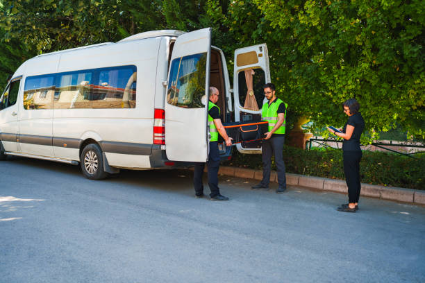 Ambulance with a wheelchair ramp, facilitating non-emergency medical transportation for individuals with mobility challenges.

