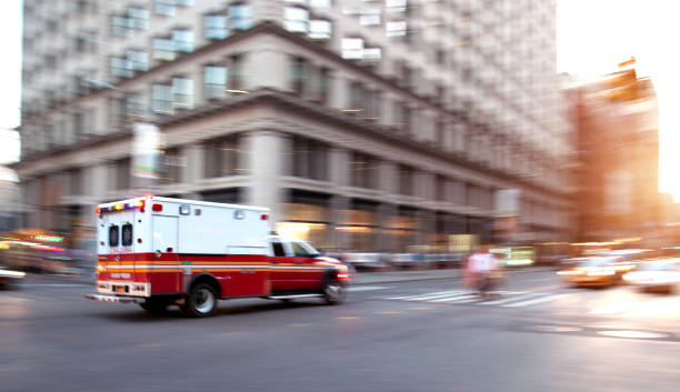 Ambulance parked outside a hospital, symbolizing fast medical transportation for urgent patient care.