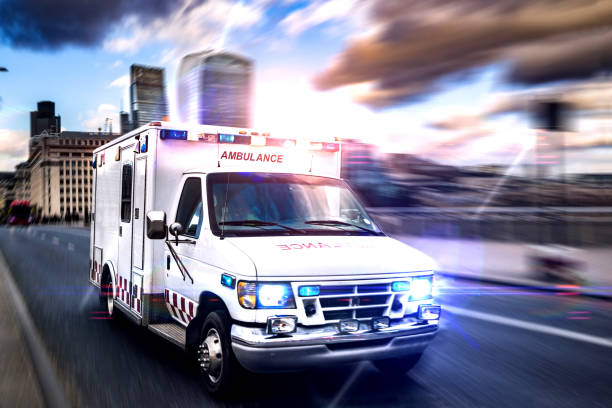 Emergency ambulance waiting outside a hospital, highlighting the importance of fast medical transportation for patients.