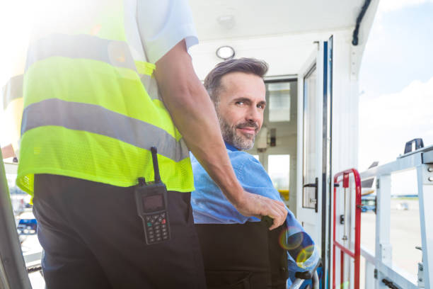 An ambulance from Private Ambulatory Services is shown with a man being assisted inside by medical personnel.